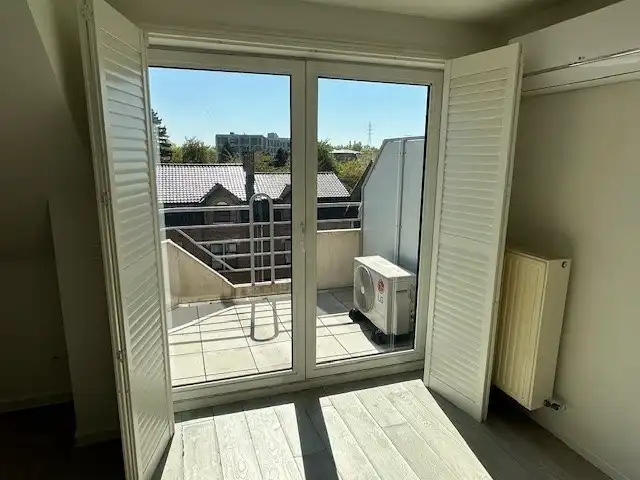 Duplex-appartement met 2 slaapkamers en 1 autostandplaats in Lanaken centrum  !  foto 4