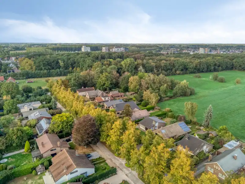 Bungalow op topligging in Astene, rust, groen en een prachtig verzicht foto 13