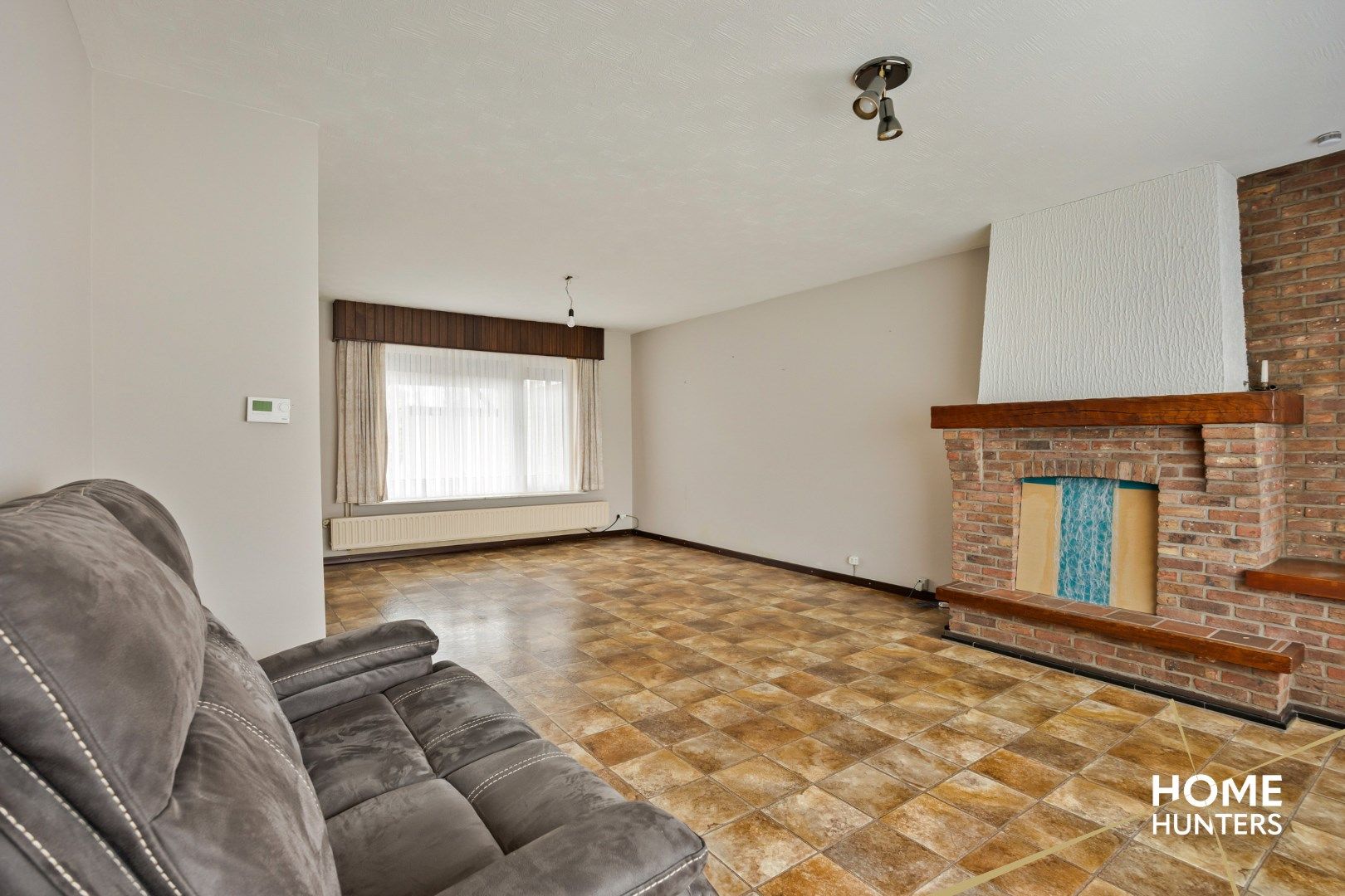 Alleenstaande, gelijkvloerse woning op een perceel van 1016 m² foto 6