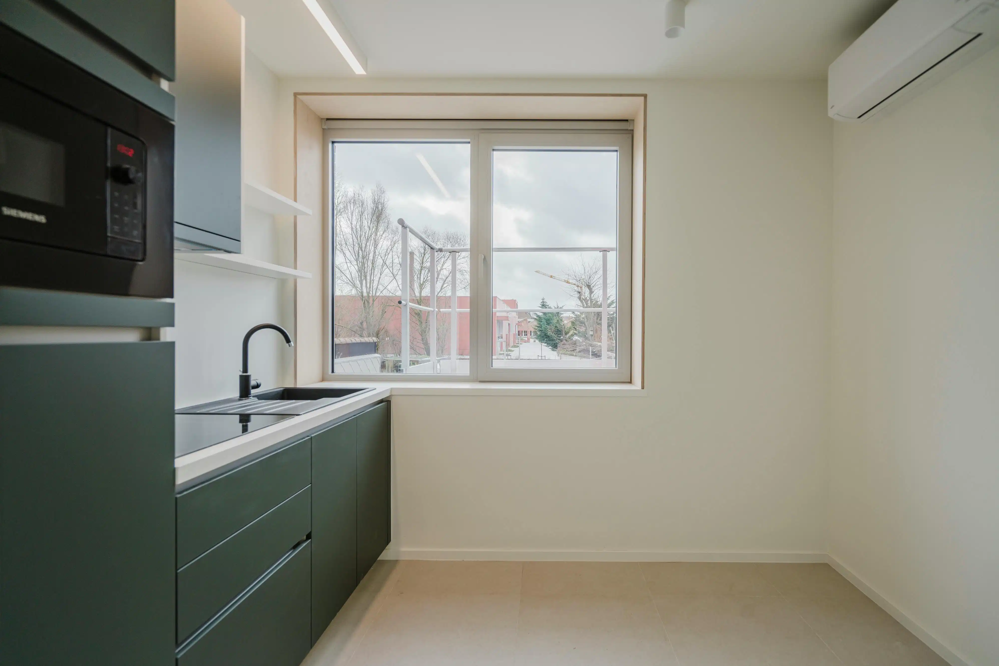 Opbrengsteigendom te koop te Kortrijk – nieuwbouw in één geheel foto 6