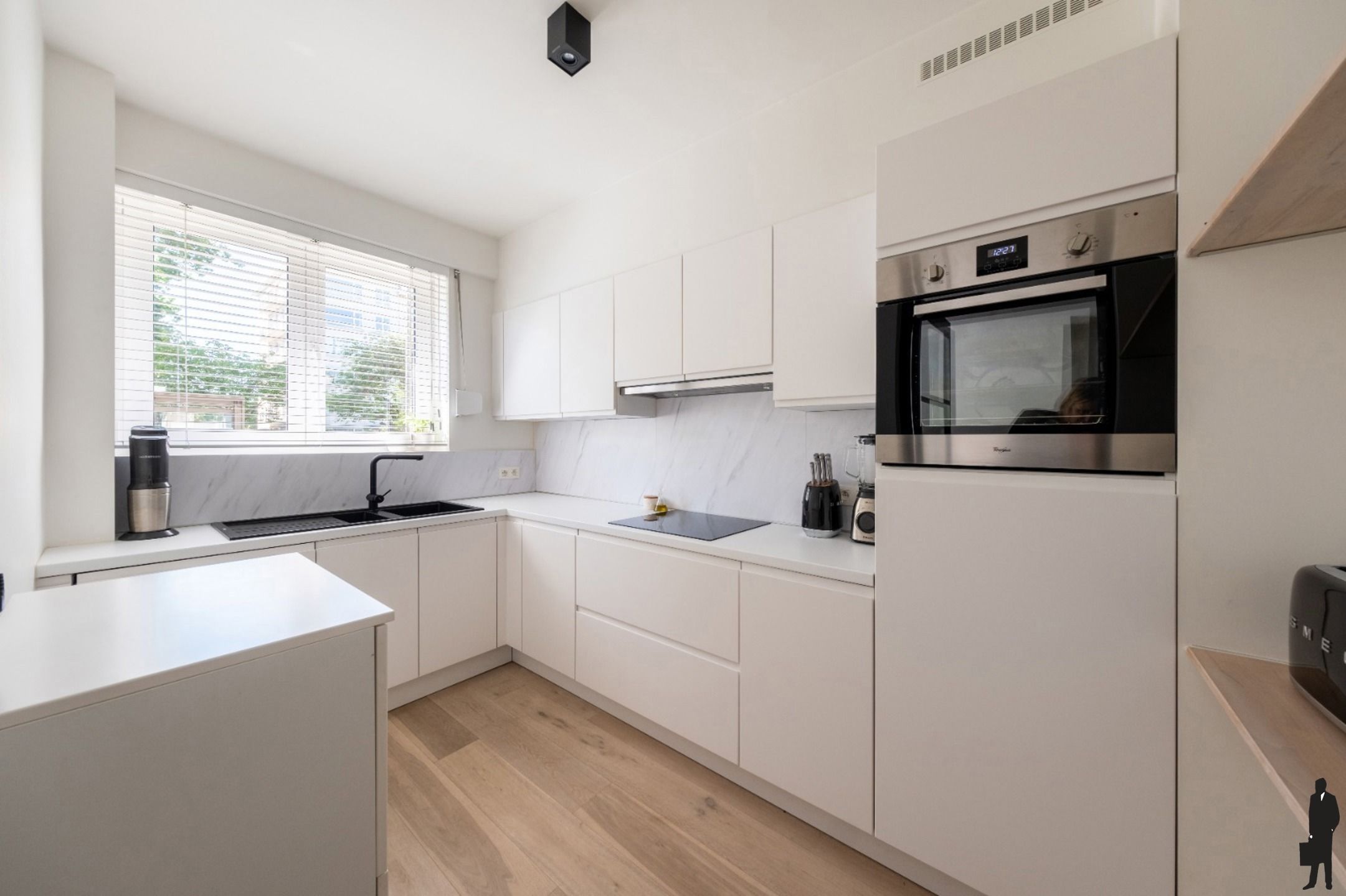 Instapklaar appartement met zonnige tuin op de grens van Wilrijk en Berchem foto 6