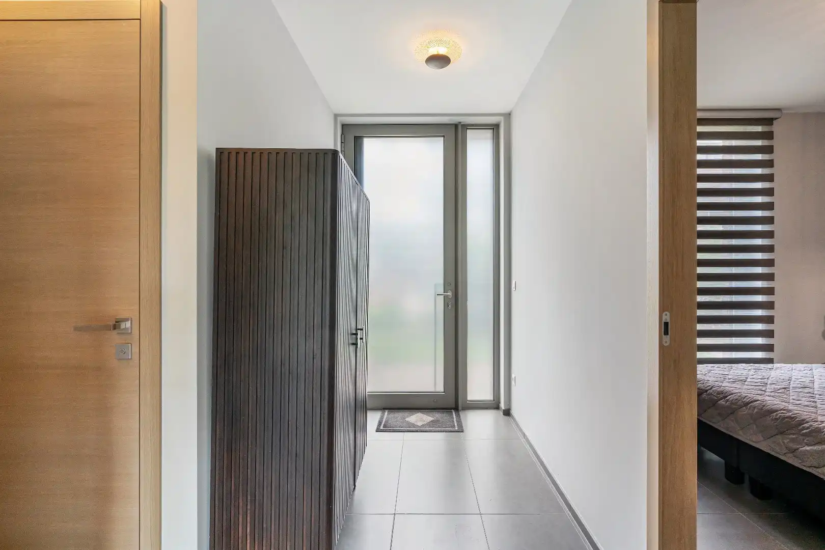 Exclusief gelijkvloers appartement met ruime terrassen, 2 slpk, extra brede autostaanplaats, centrum Genk foto 13