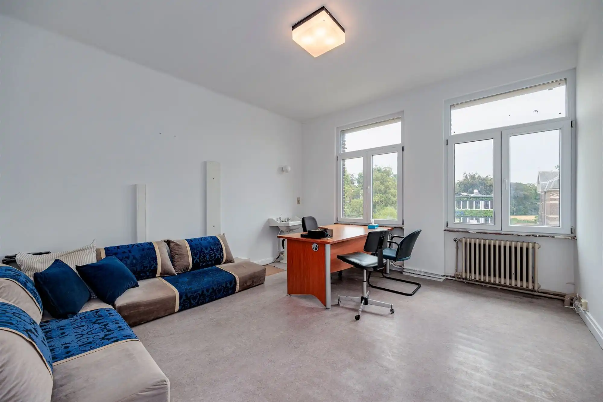 Ruime woning met veelzijdige praktijkruimtes foto 23