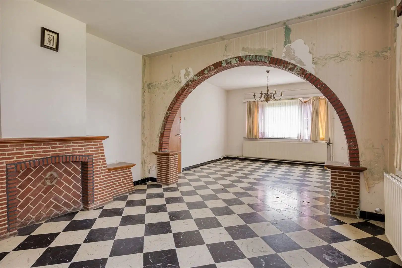TE KOOP: Te renoveren woning met ruim perceel en projectmogelijkheden in Lummen! foto 8