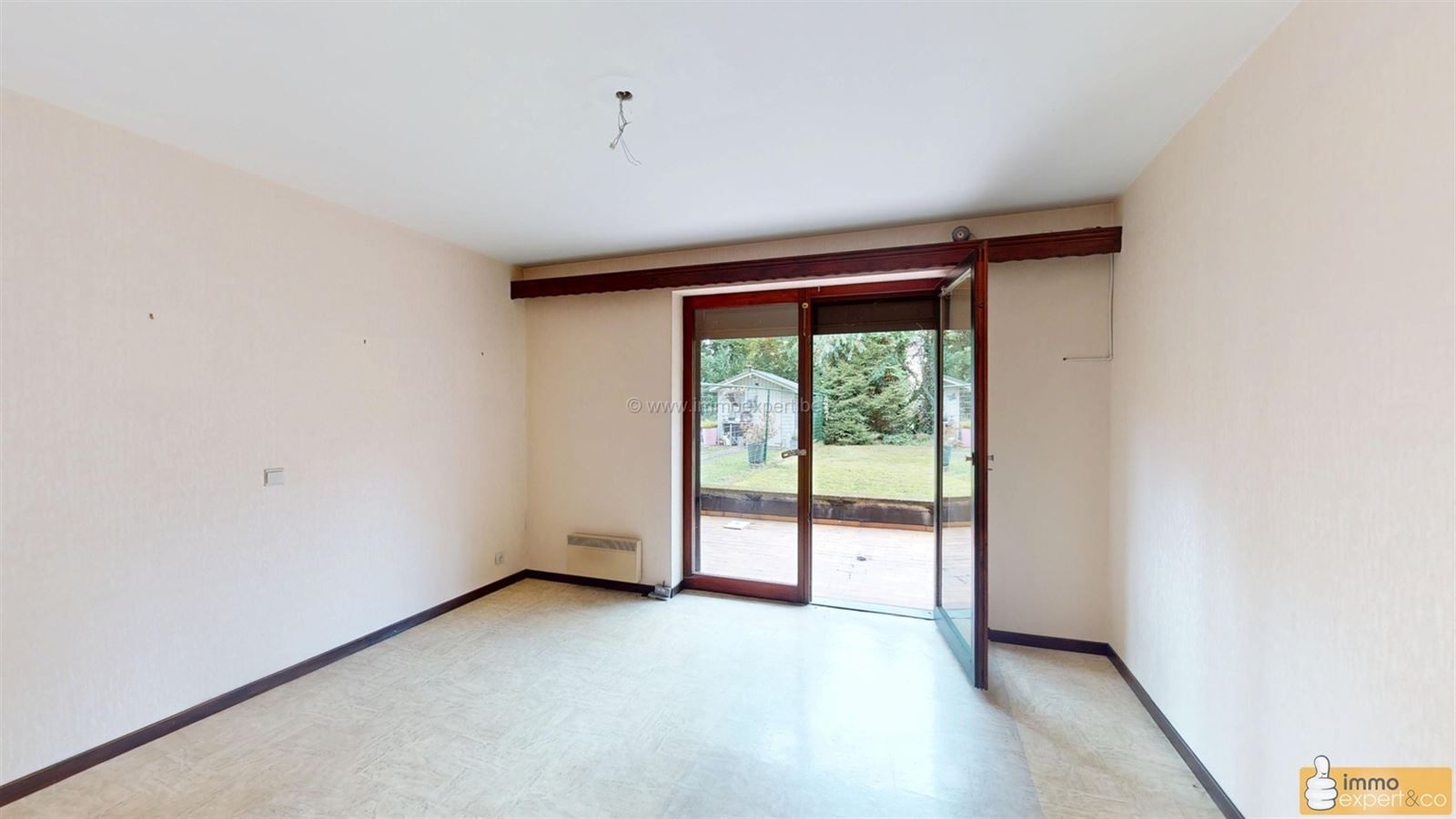 STOMBEEK-BEVER: Ruim appartement + tuin + garage. foto 10