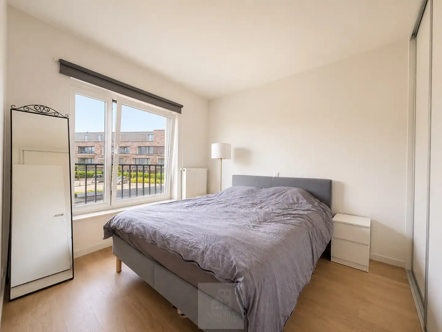 Zonnig 2 slpk-appartement met zuidgericht terras + autostaanplaats! foto 11