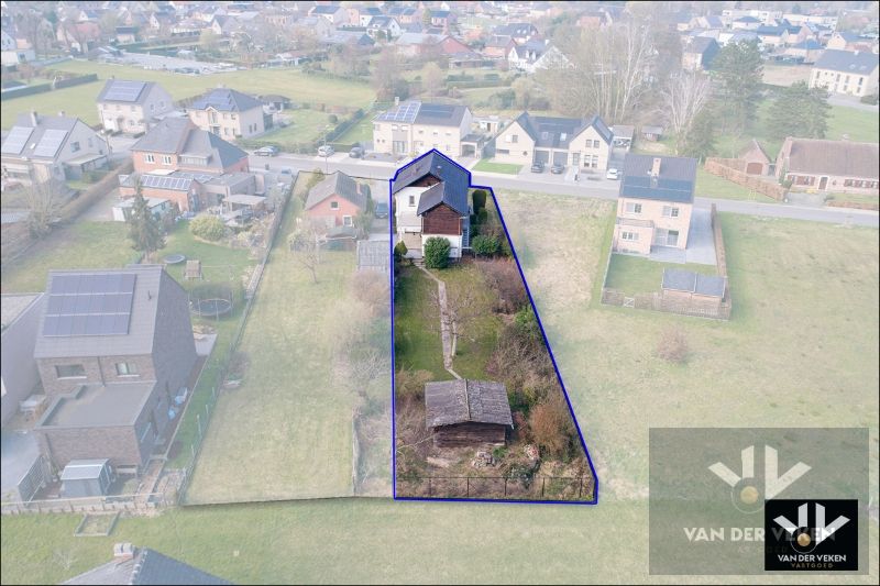 Bouwgrond +- 10 aren (huidige woning wordt afgebroken door de huidige eigenaars) voor open bebouwing op een rustige, maar zeer goed bereikbare locatie in het charmante Diepenbeek foto 2