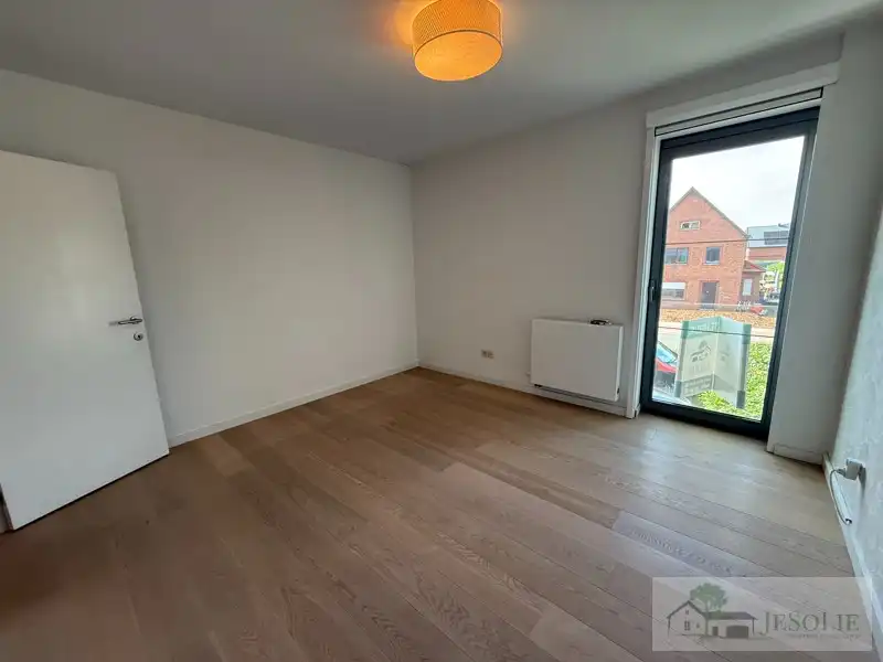 Tiptop verzorgd 2 slpk appartement met groot terras foto 12