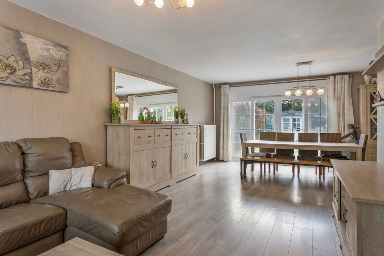 immo DAVID stelt voor: 3-gevel woning foto 2