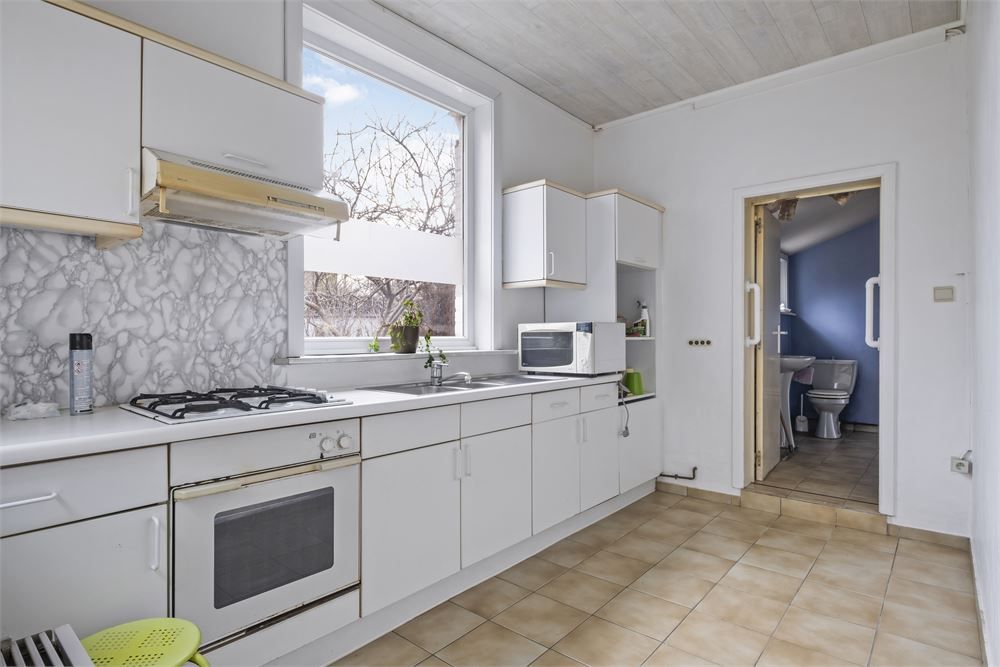 Op te frissen herenwoning met tal van mogelijkheden! foto 6