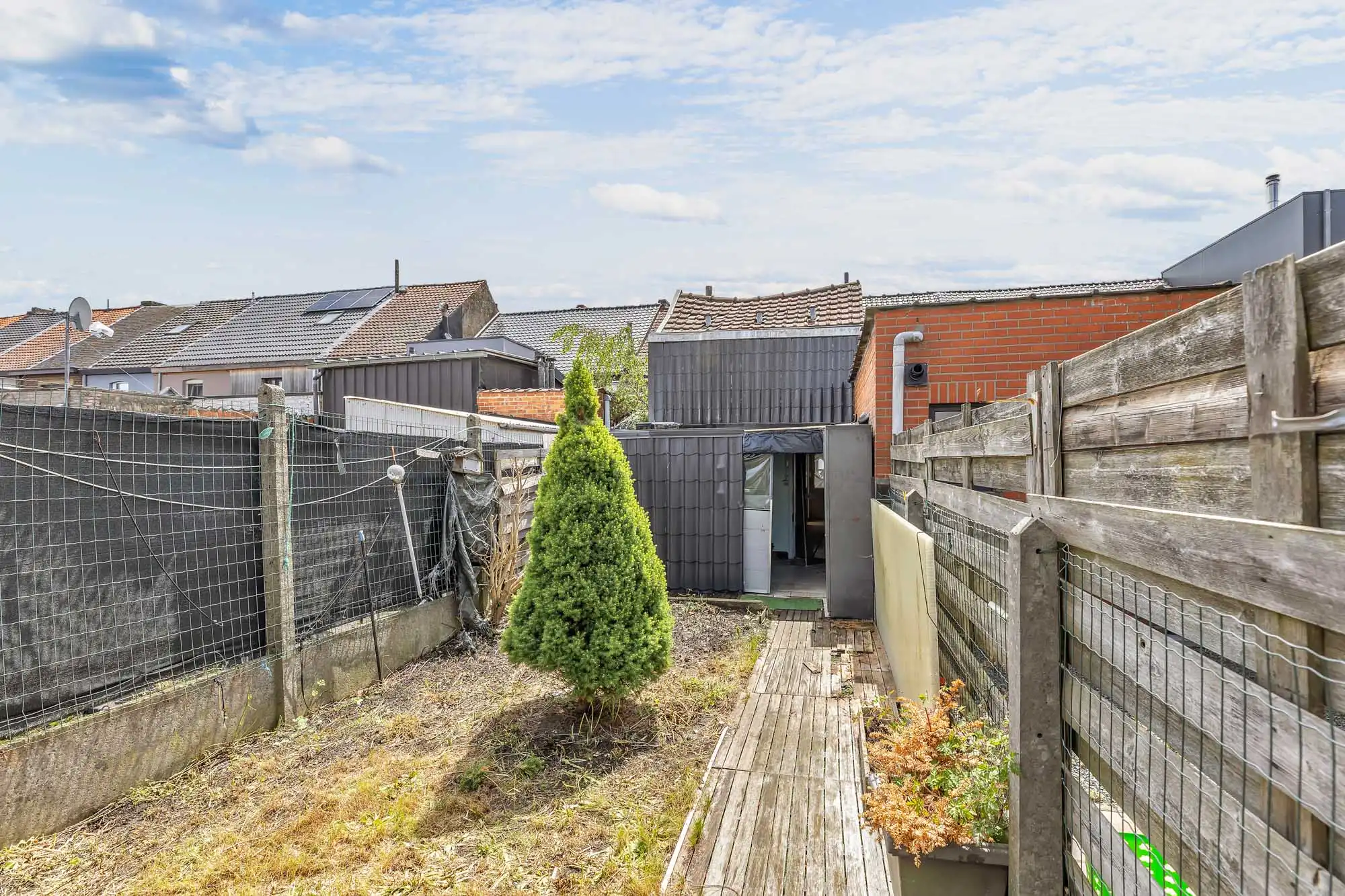 Te renoveren rijwoning met tuin foto 19
