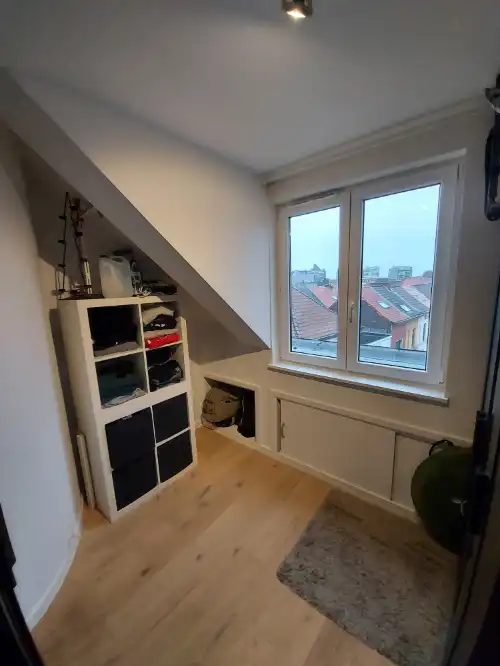 Lichtrijk en energiezuinig 2-slaapkamerappartement met lift, terras en kelderruimte foto 11