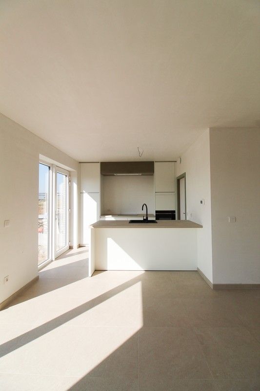 Halfopen nieuwbouwwoning met garage Roeselare foto 5