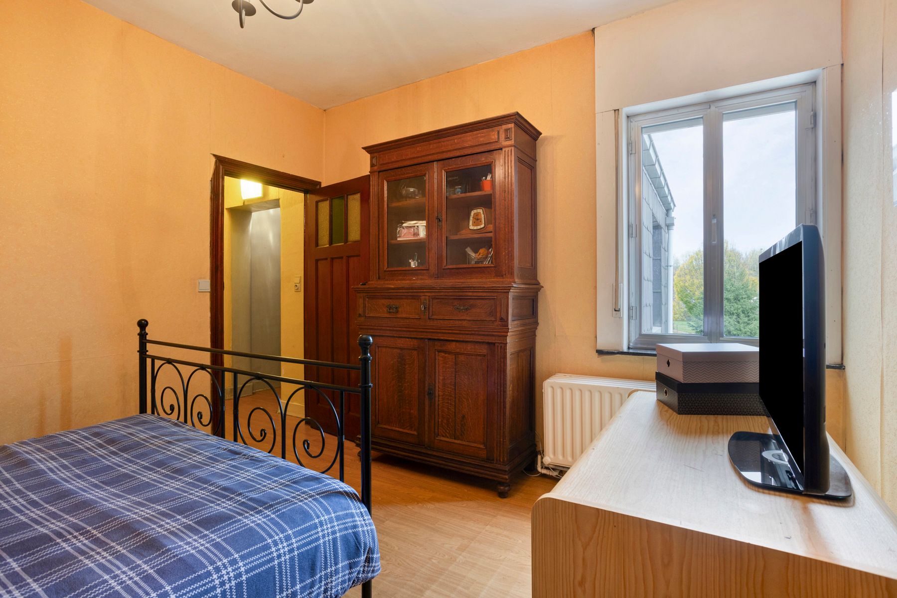 Charmante halfopen woning met potentieel foto 16