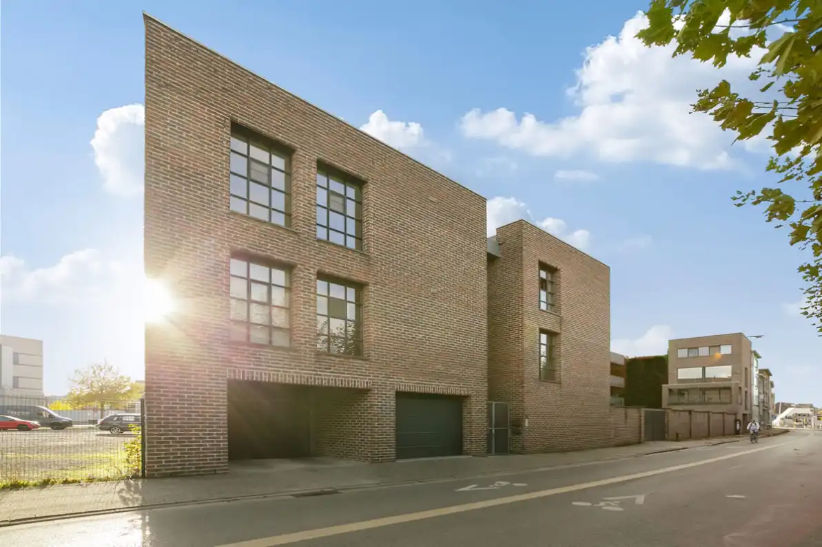 Stijlvol appartement in iconisch gebouw met ruim terras in hartje Aalst foto 2