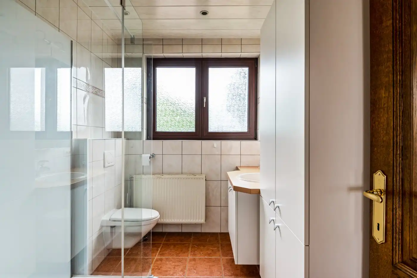 Centraal gelegen beletage-woning met 3 slpk., inpandige garage en tuin foto 13