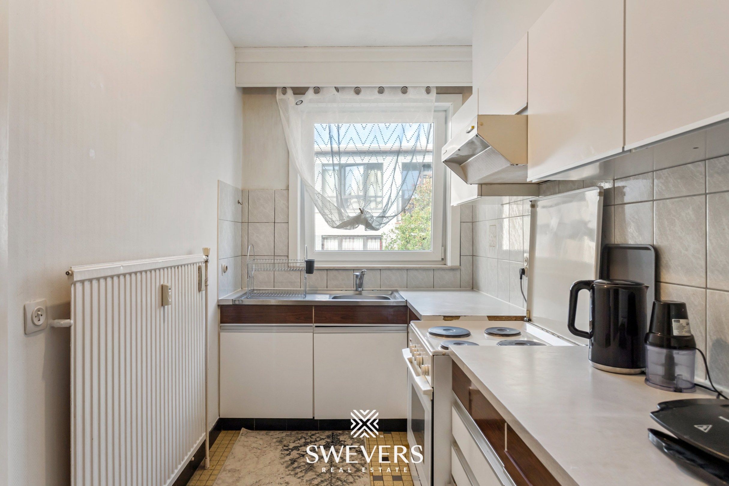 Instapklaar 1-slaapkamerappartement met terras in hartje Diest foto 11