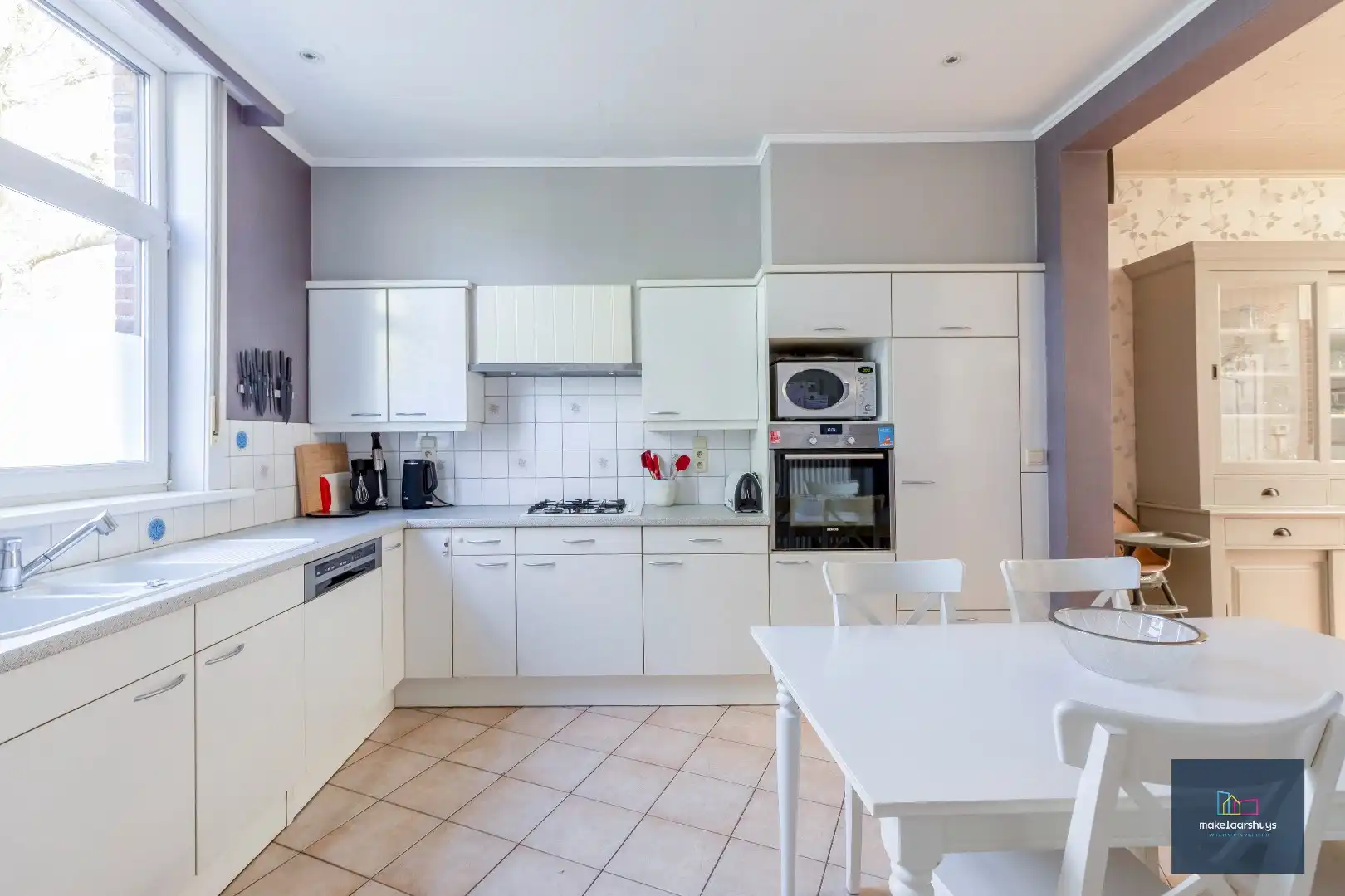 Goed onderhouden en ruime woning in rij met tuin/terras te Wondelgem foto 7