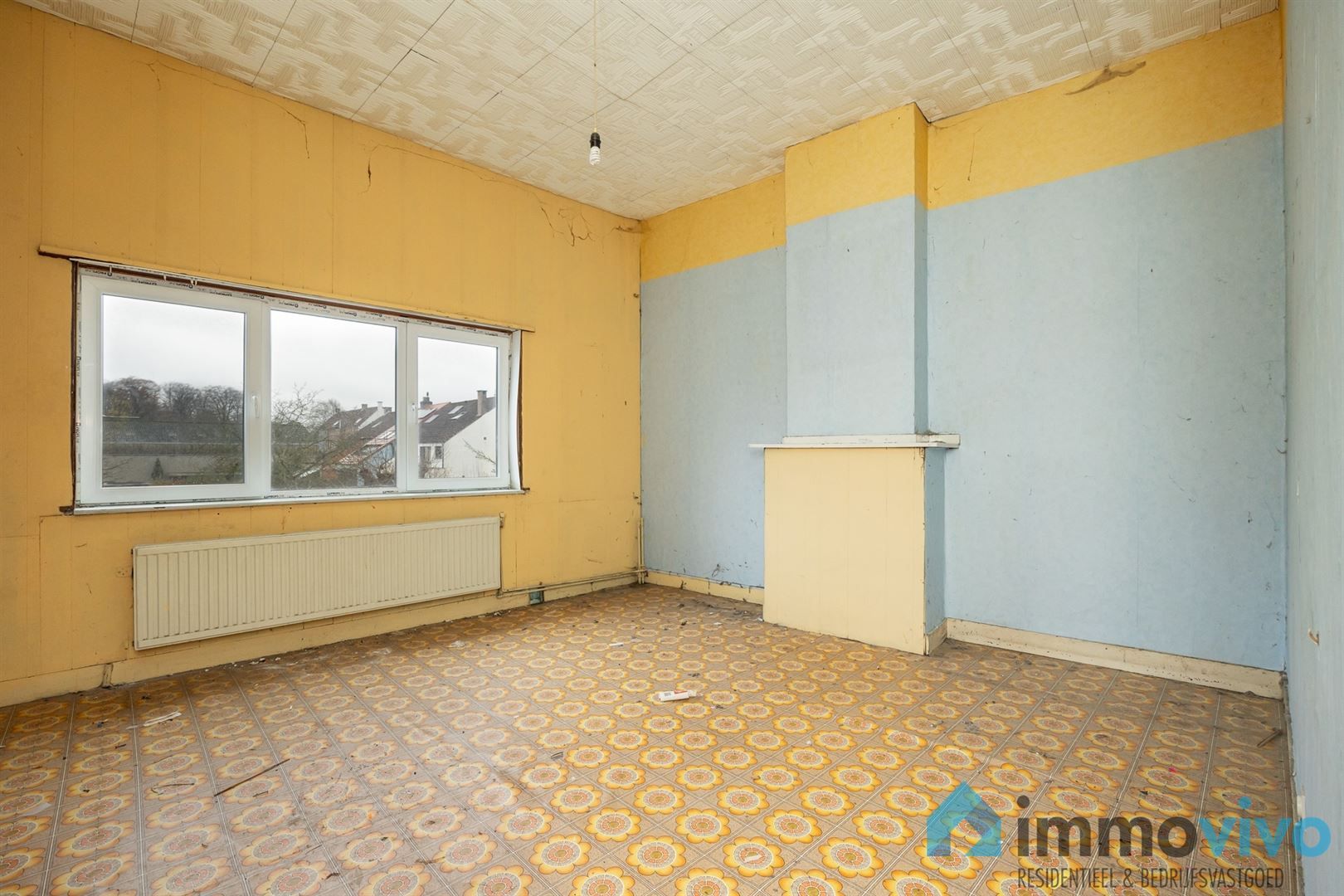 Ruime te renoveren gezinswoning met 4 slpk's en tuin foto 21