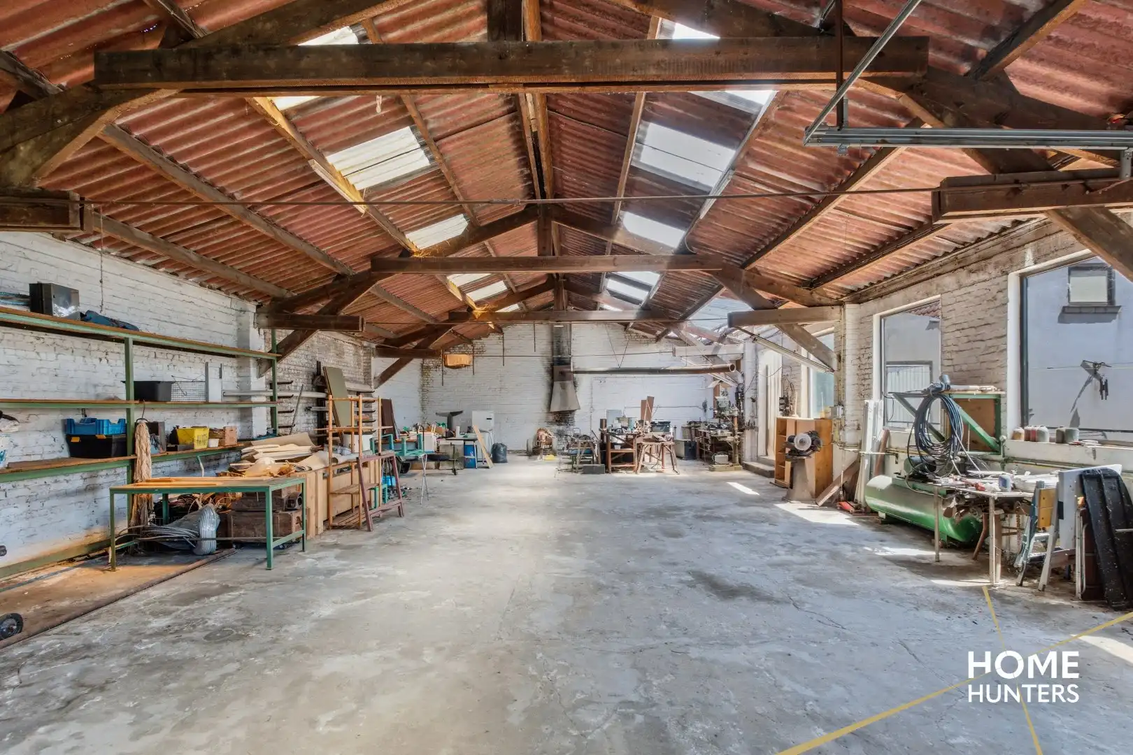 Ruime halfopen bebouwing met loods van 200 m² op een perceel van 919 m² foto 22