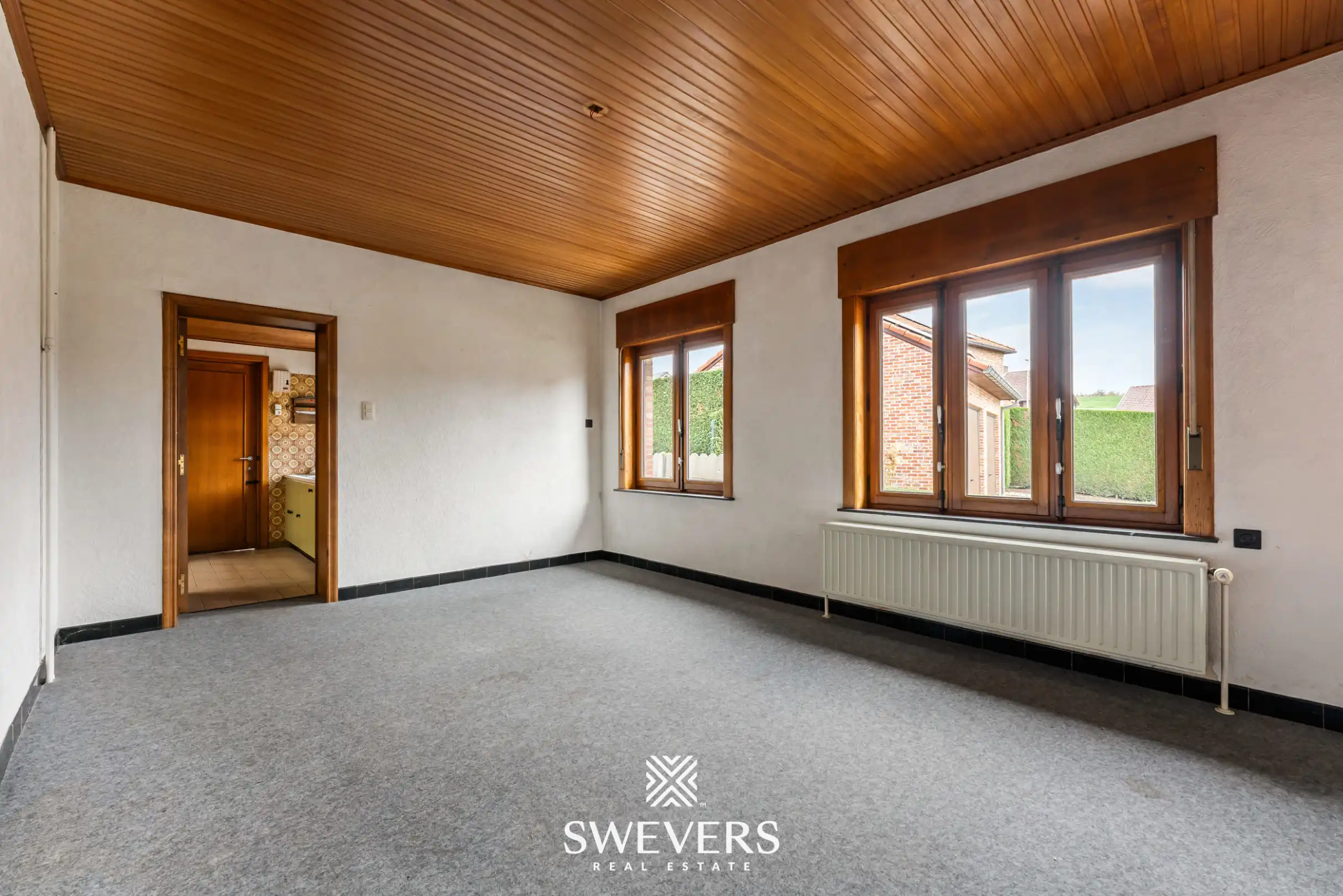 Woning met veel potentieel en ruime tuin in Borgloon foto 11