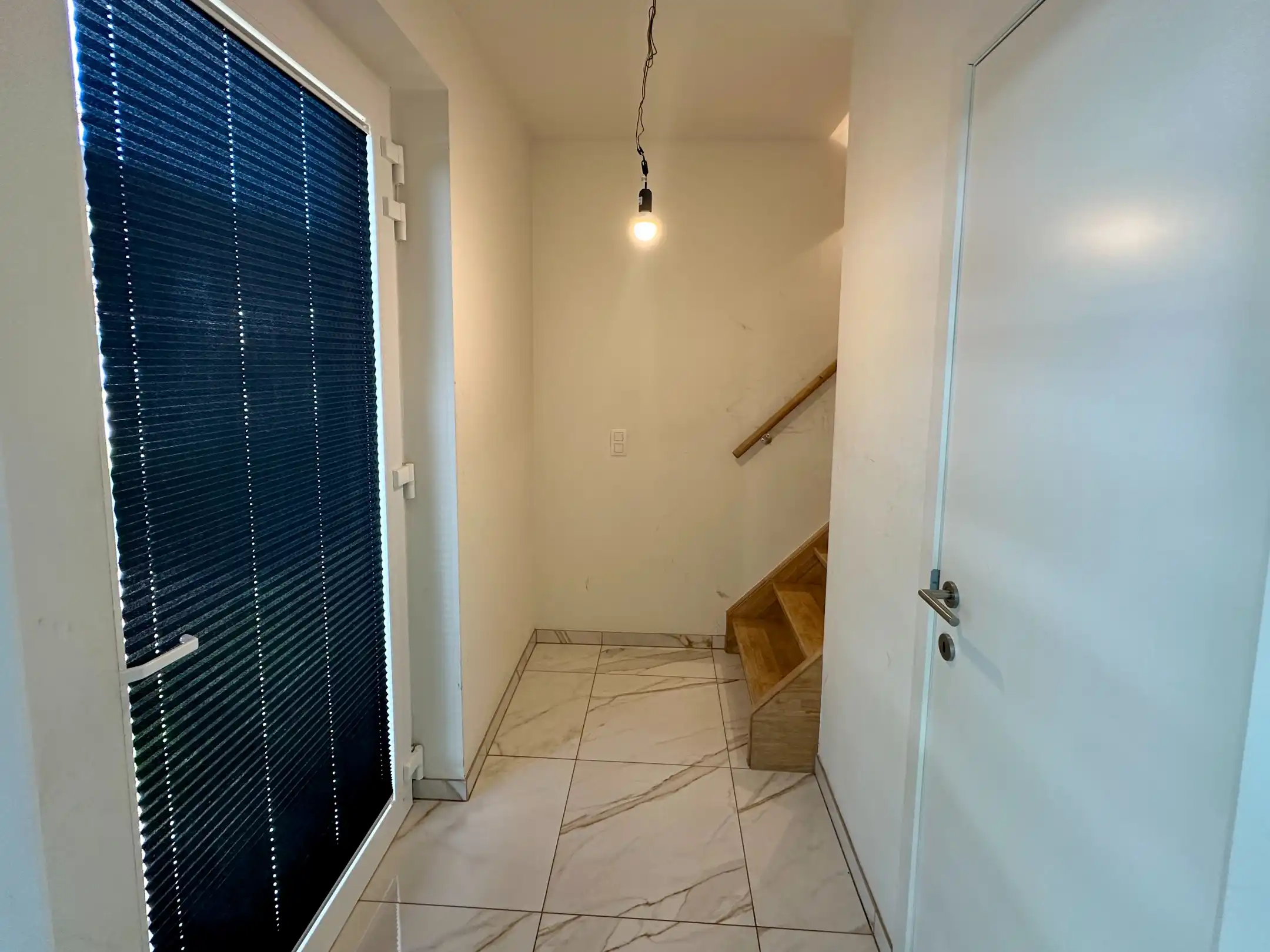 Nieuwbouwrijwoning met tuin, carport en drie slaapkamers in Maasmechelen foto 2