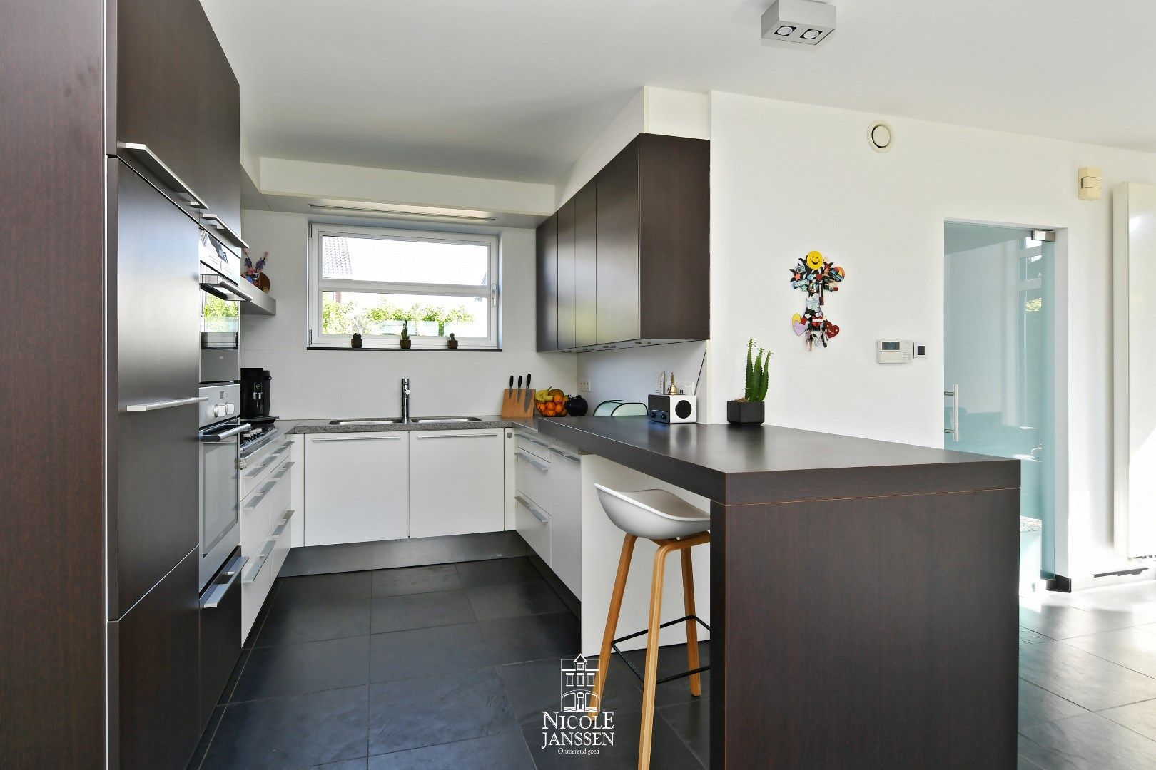 Halfvrijstaande gezinswoning met vrijstaande garage foto 8