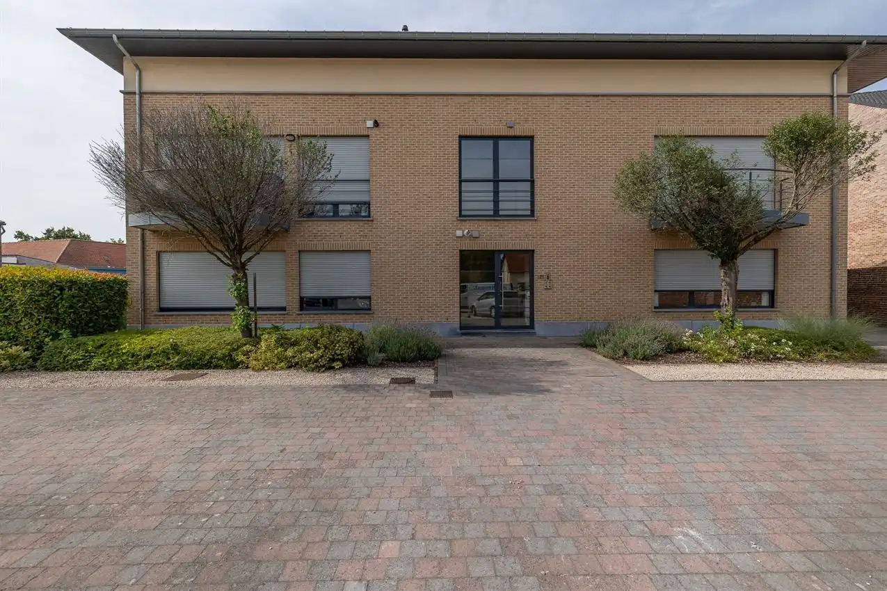 Ruim gelijkvloers wonen met tuin én rendement. foto 26
