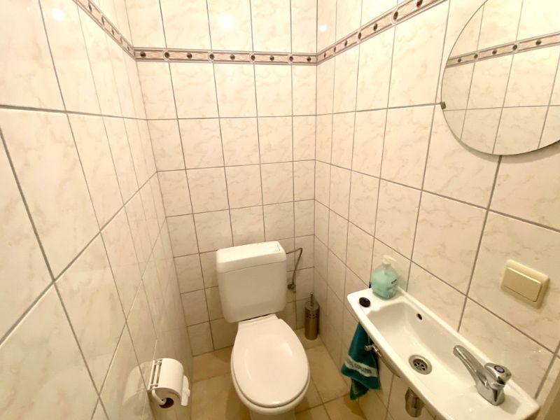 Centraal gelegen appartement met 2 kamers, kelder en garage foto 12
