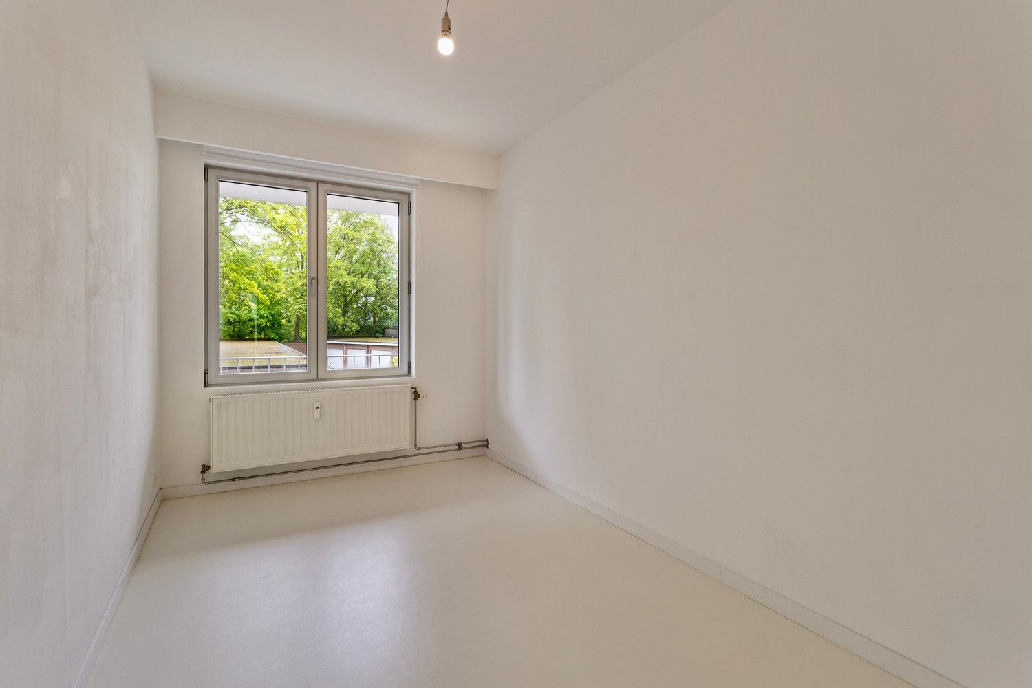 Instapklaar trendy appartement op wandelafstand van het Boekenberg Park met 3 slks, ruim terras en garagebox! foto 26