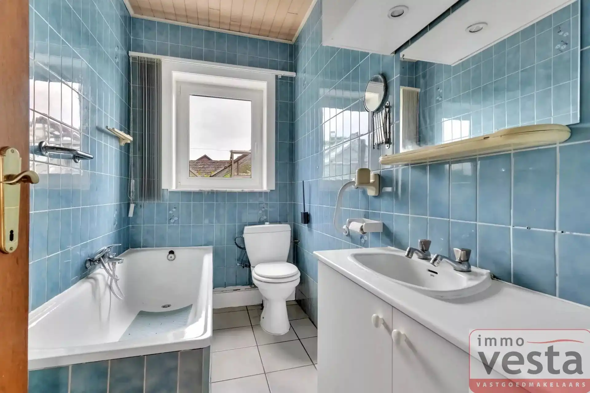 Bungalow met vier slaapkamers, inpandige garage en ruime tuin in Kortessem foto 13