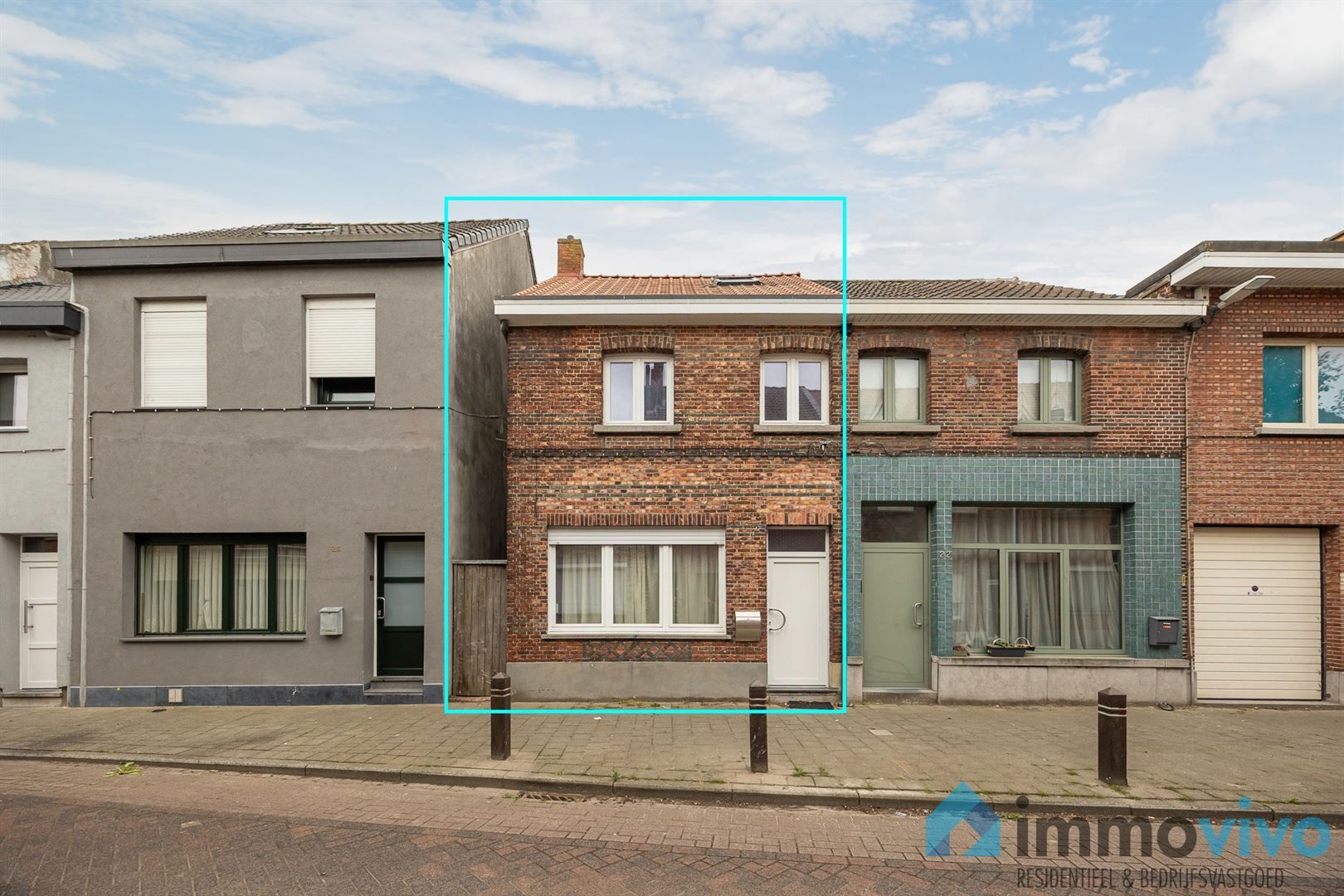 Hoofdfoto van de publicatie: Te renoveren gezinswoning met 2/3 slaapkamers en zuidgerichte tuin.