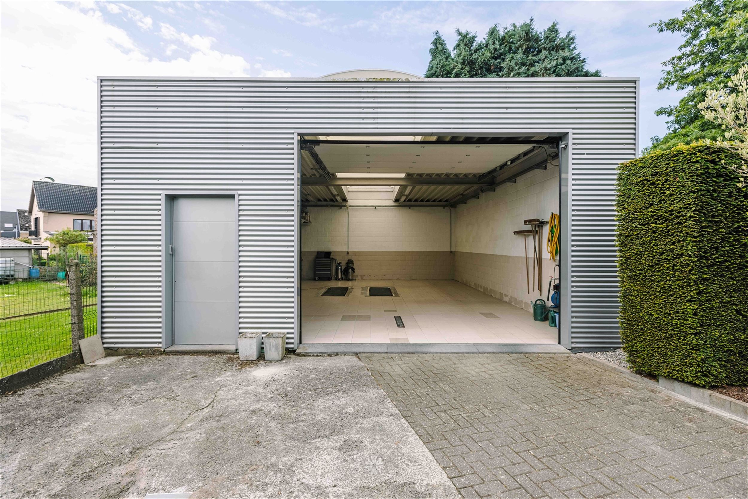 Veelzijdige bel-etage met grote garage en in het centrum van Sint-Maria-Oudenhove foto 28