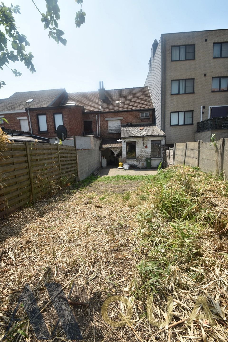 Nabij het centrum van Lebbeke gelegen te renov. rijwoning of bouwgrond op een terrein van 2 are 80 ca.  foto 9
