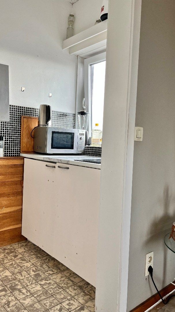 Verhuurde studio (31m²)met open zicht op het station foto 13