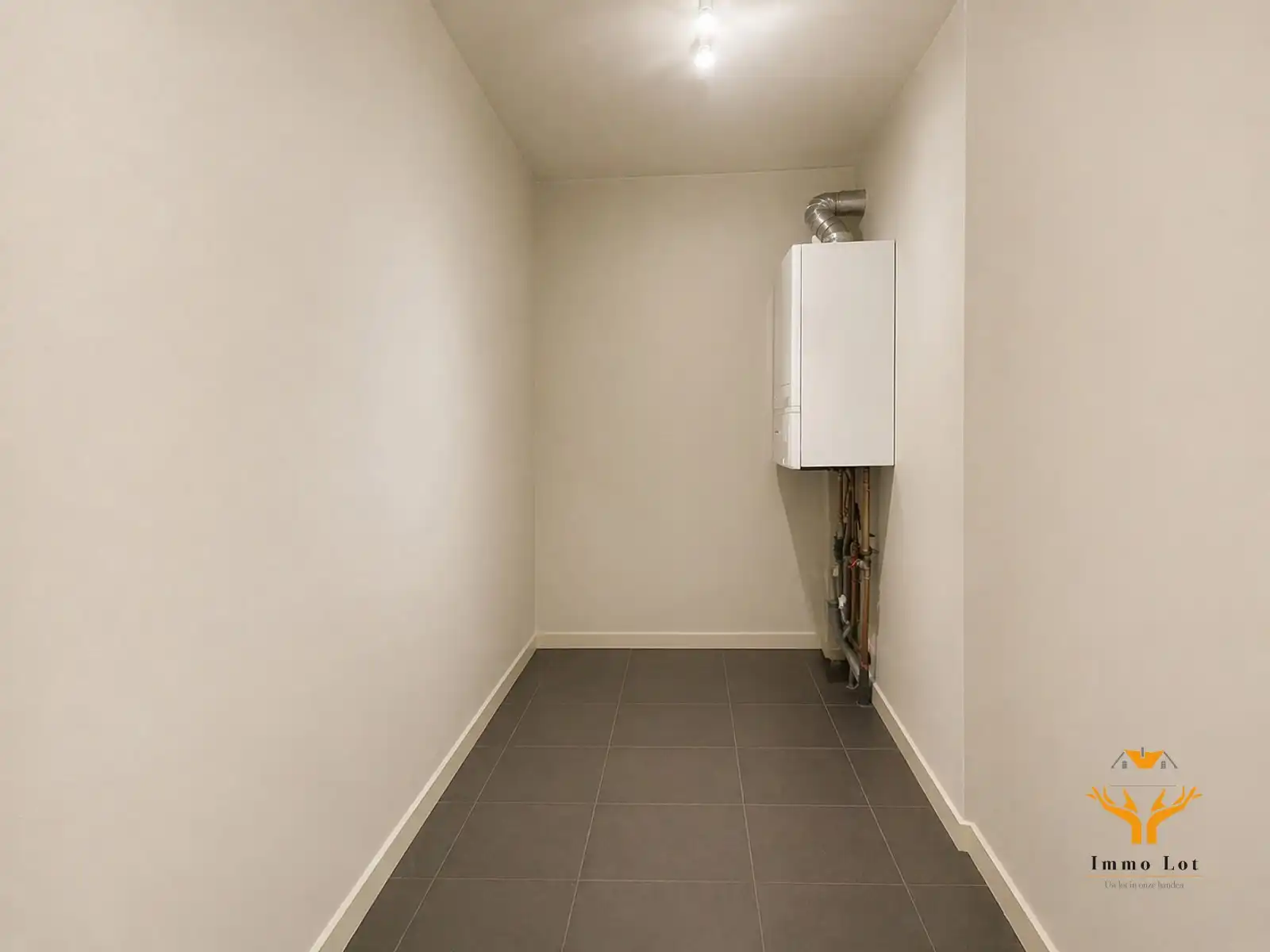 Eénslaapkamerappartement in hartje Zele foto 9