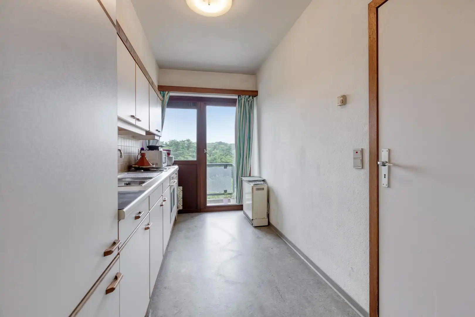 Ruim 3-slaapkamerappartement te koop in Genk foto 10