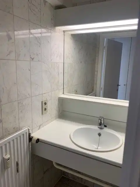 Volledig gerenoveerde studio met zicht op zee! foto 14