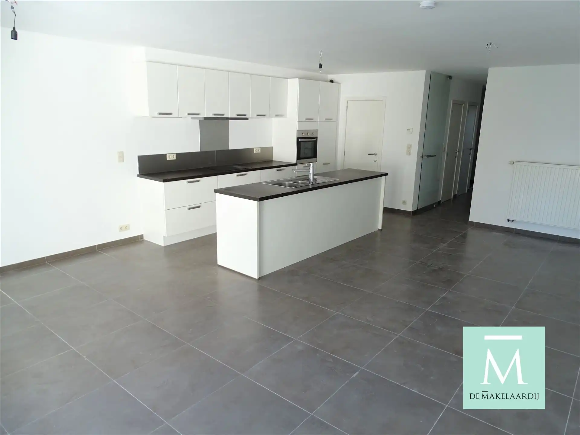 Mooi duplex appartement in centrum SKW met 2 slpkrs en tuin foto 8