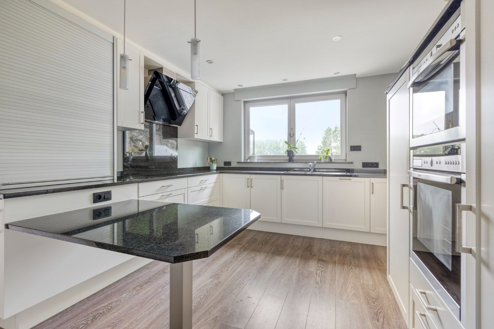 Instapklare woning met prachtig aangelegde tuin foto 11