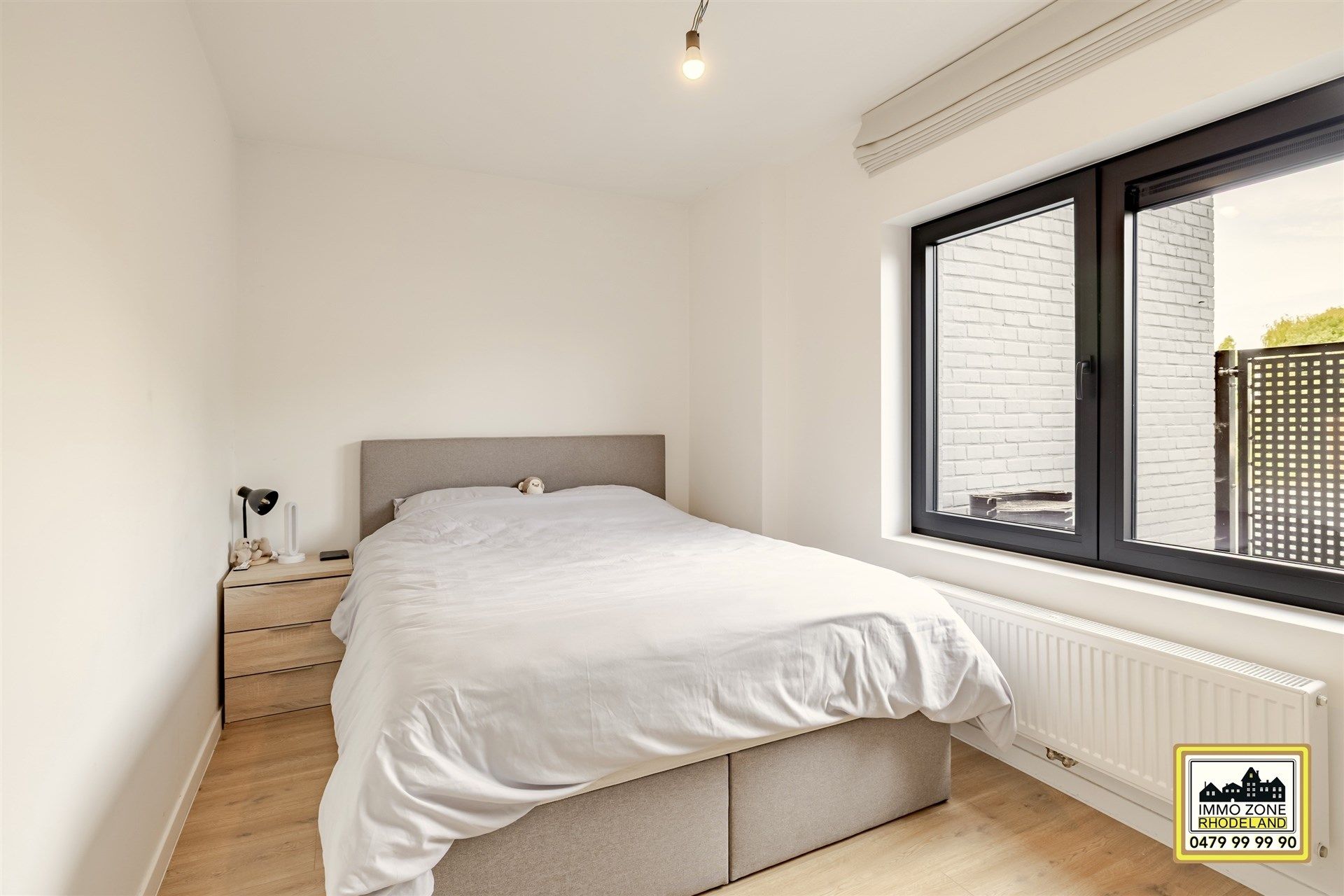 Luxueus gelijkvloers appartement met 2 slpks en terras foto 17