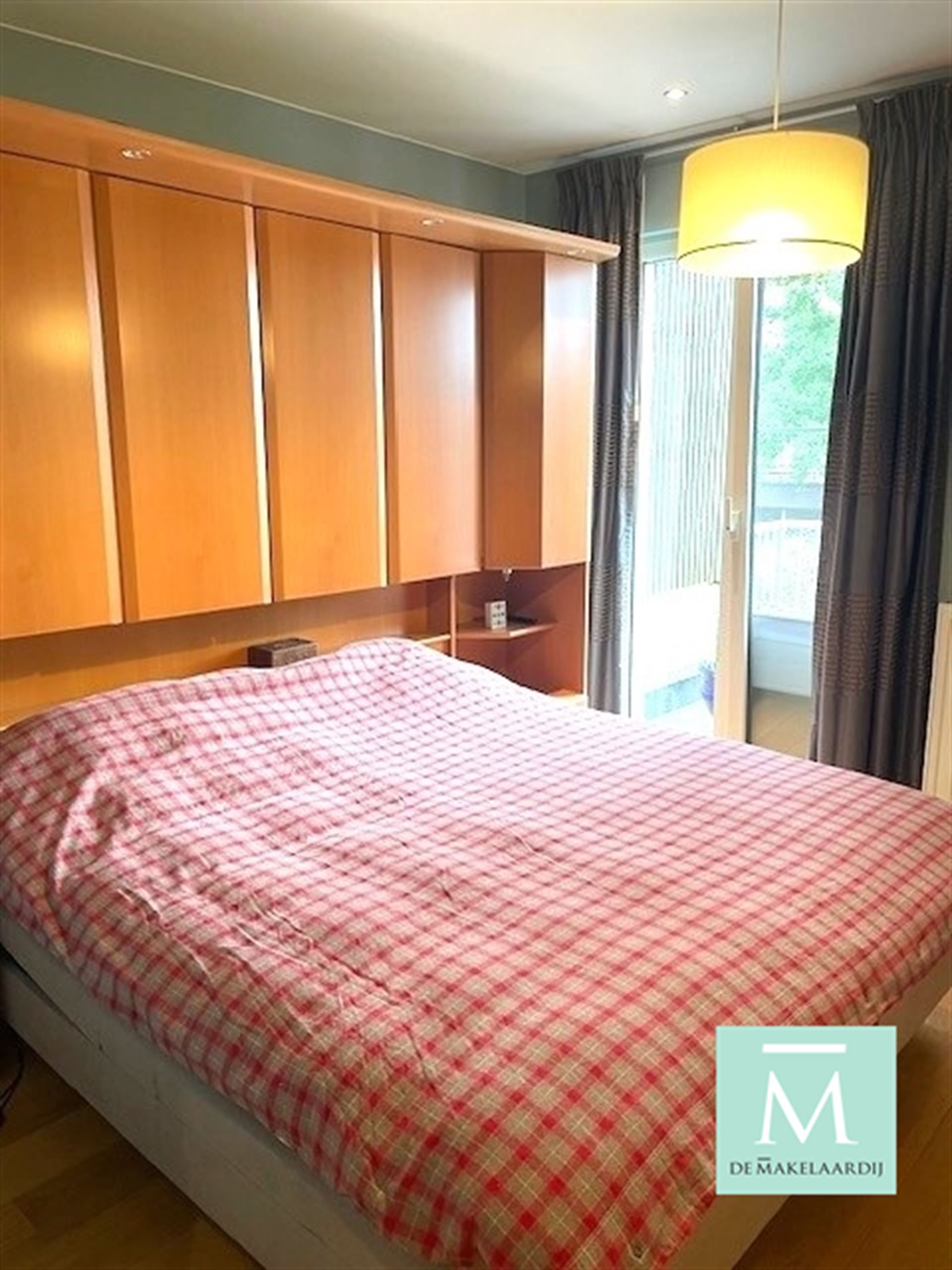 Uiterst verzorgd en ruim appartement, 2 slaapkamers, terras en garage! foto 5