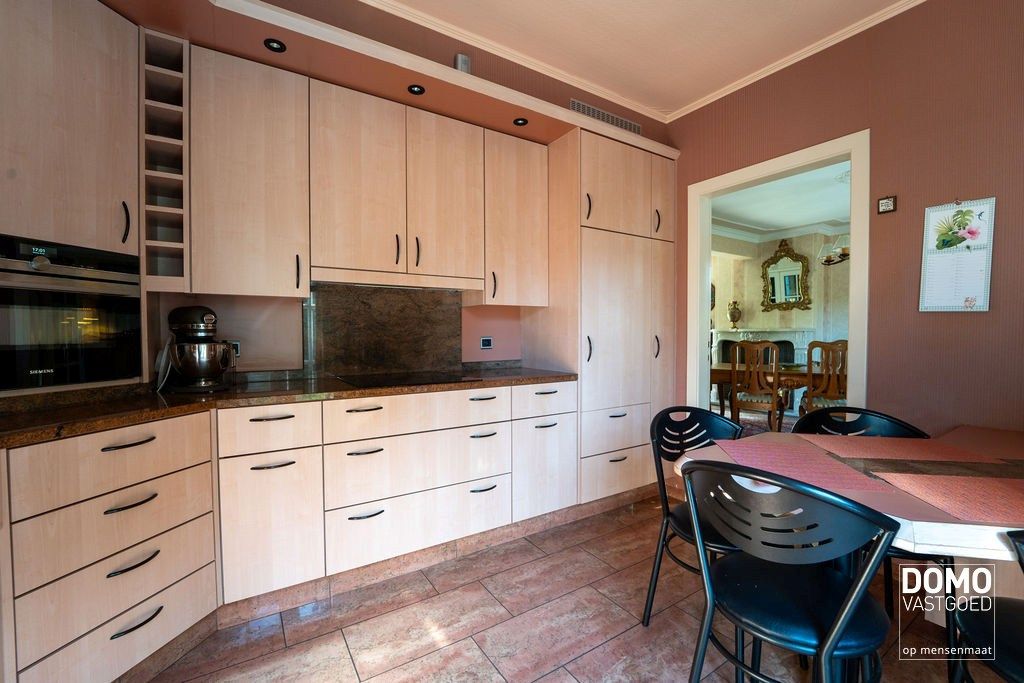 Open bebouwing met 3 slaapkamers, tuin en garage in rustige Sluisstraat te Hasselt foto 10