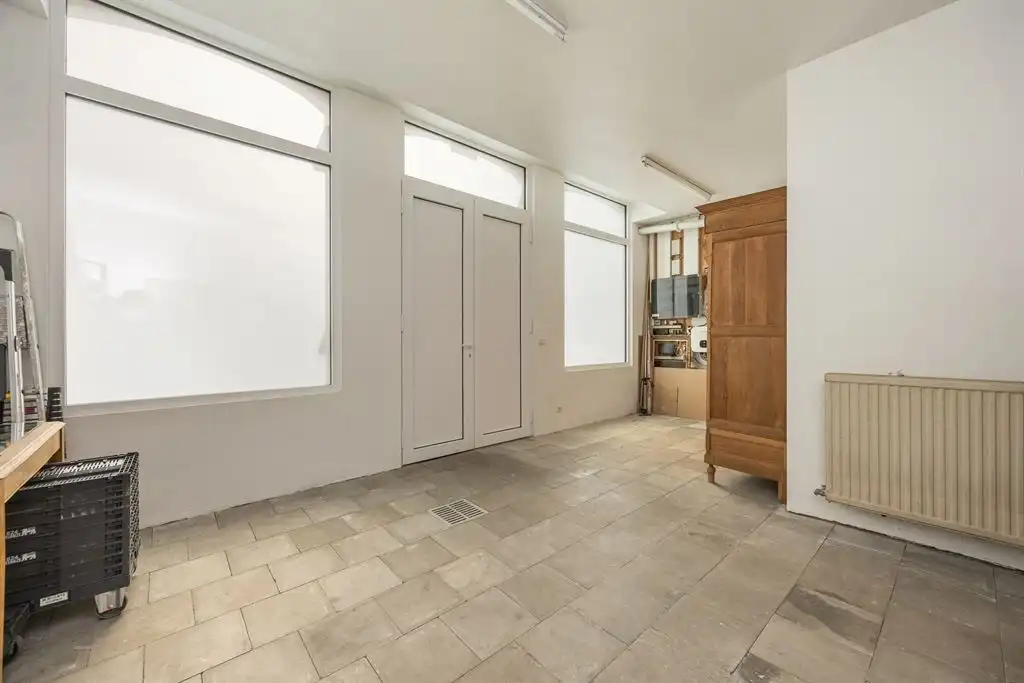 Unieke woning met eclectische gevels en dakterras foto 27