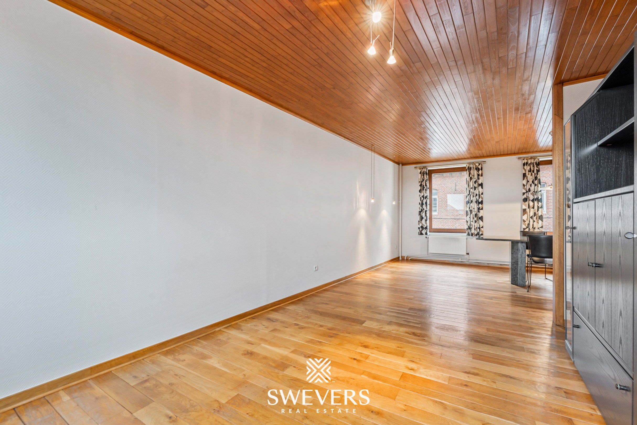 Instapklaar handelspand met woonst en tuin in Herk-de-Stad foto 12