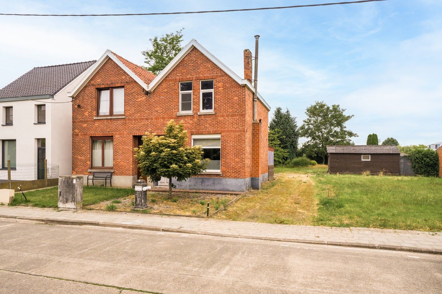 Lichtrijke woonst met 2 slaapkamers, grote tuin en mooie buitenaanleg! foto 22