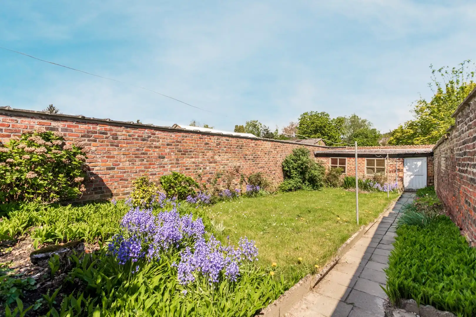 Te renoveren, karaktervolle woning met tal van mogelijkheden en tuin foto 8
