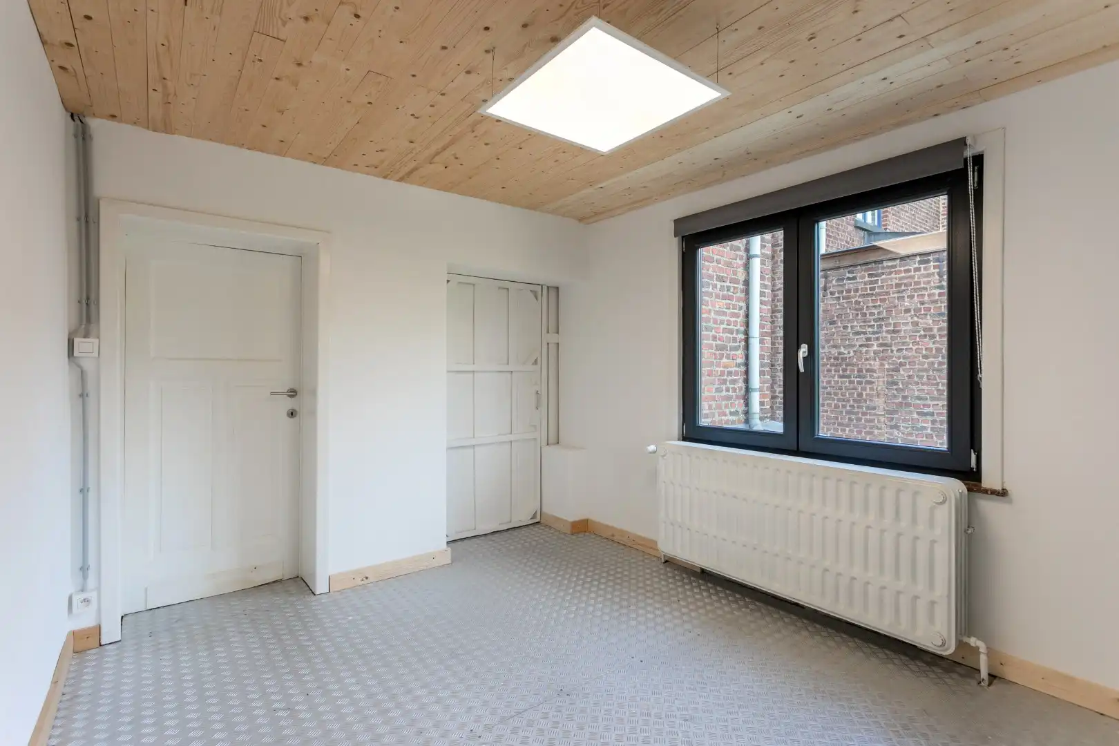 Handelshuis met woongedeelte, garage en tuin te Beersel foto 7