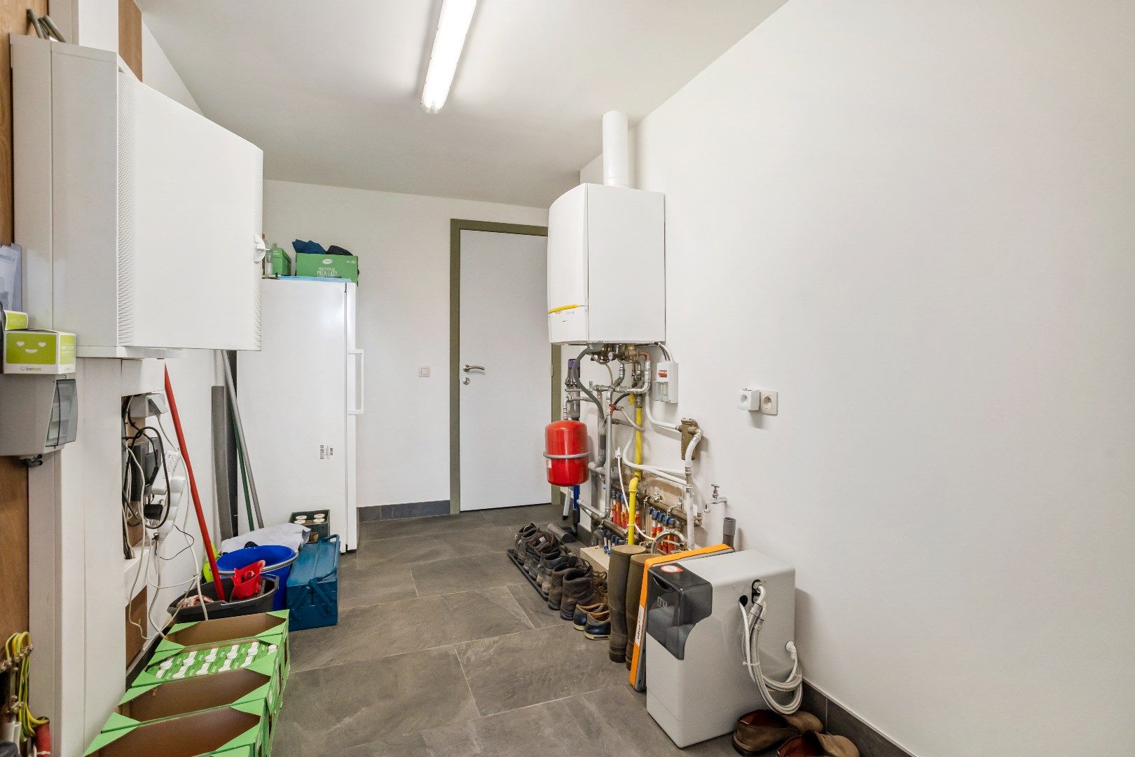 Deze prachtige woning werd 10 jaar geleden volledig gerenoveerd en biedt een moderne en comfortabele leefomgeving. foto 18