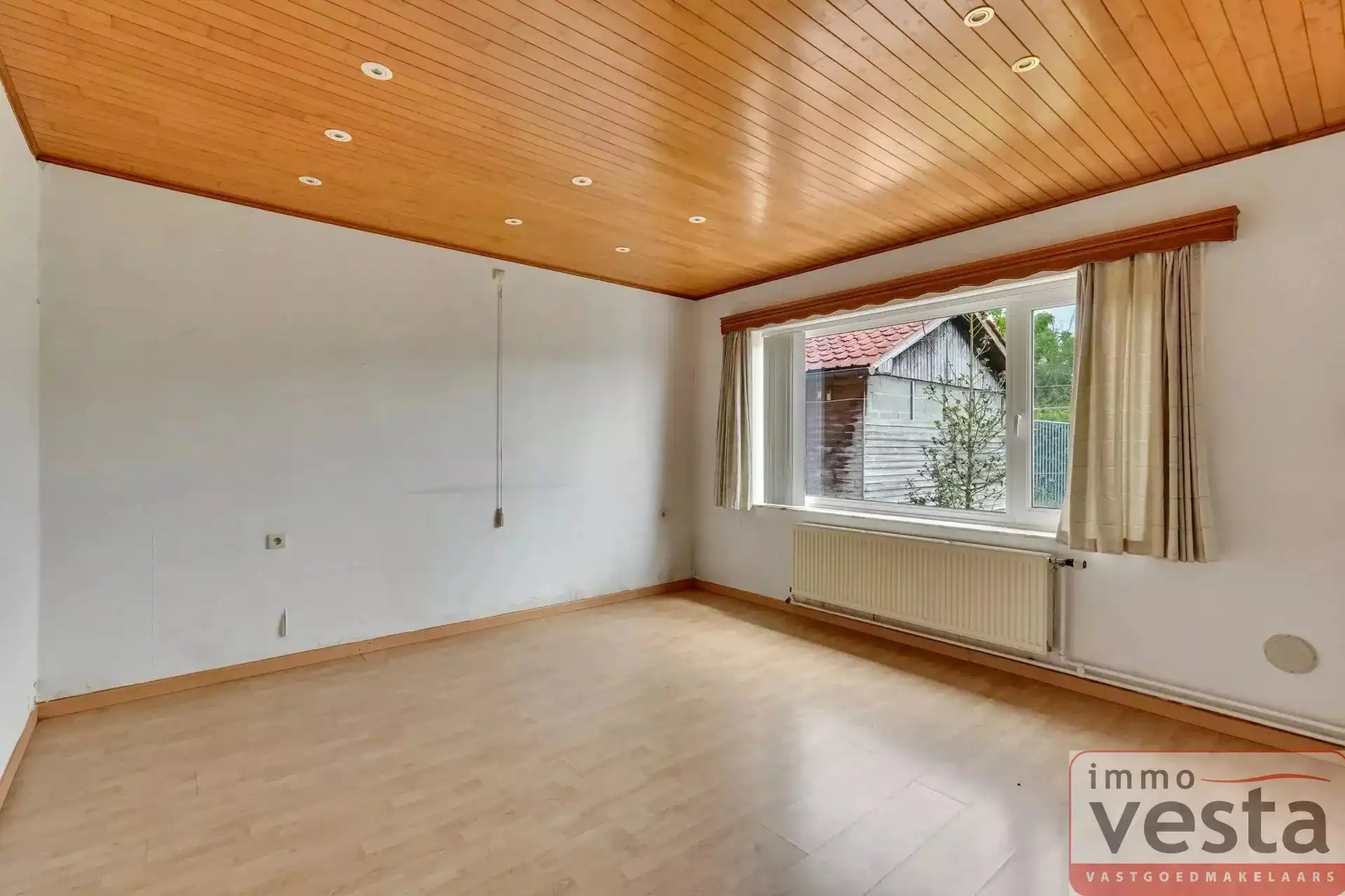 Bungalow met vier slaapkamers, inpandige garage en ruime tuin in Kortessem foto 8